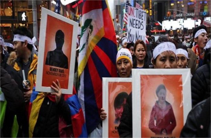 अमेरिका तक पहुंची तिब्बती कार्यकर्ता के आत्मदाह की आग, UN मुख्यालय के बाहर उठाई कार्रवाई की मांग